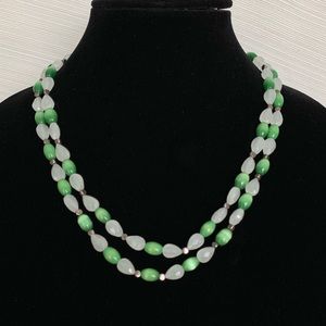 Chico’s. Double stranded green and white necklace.